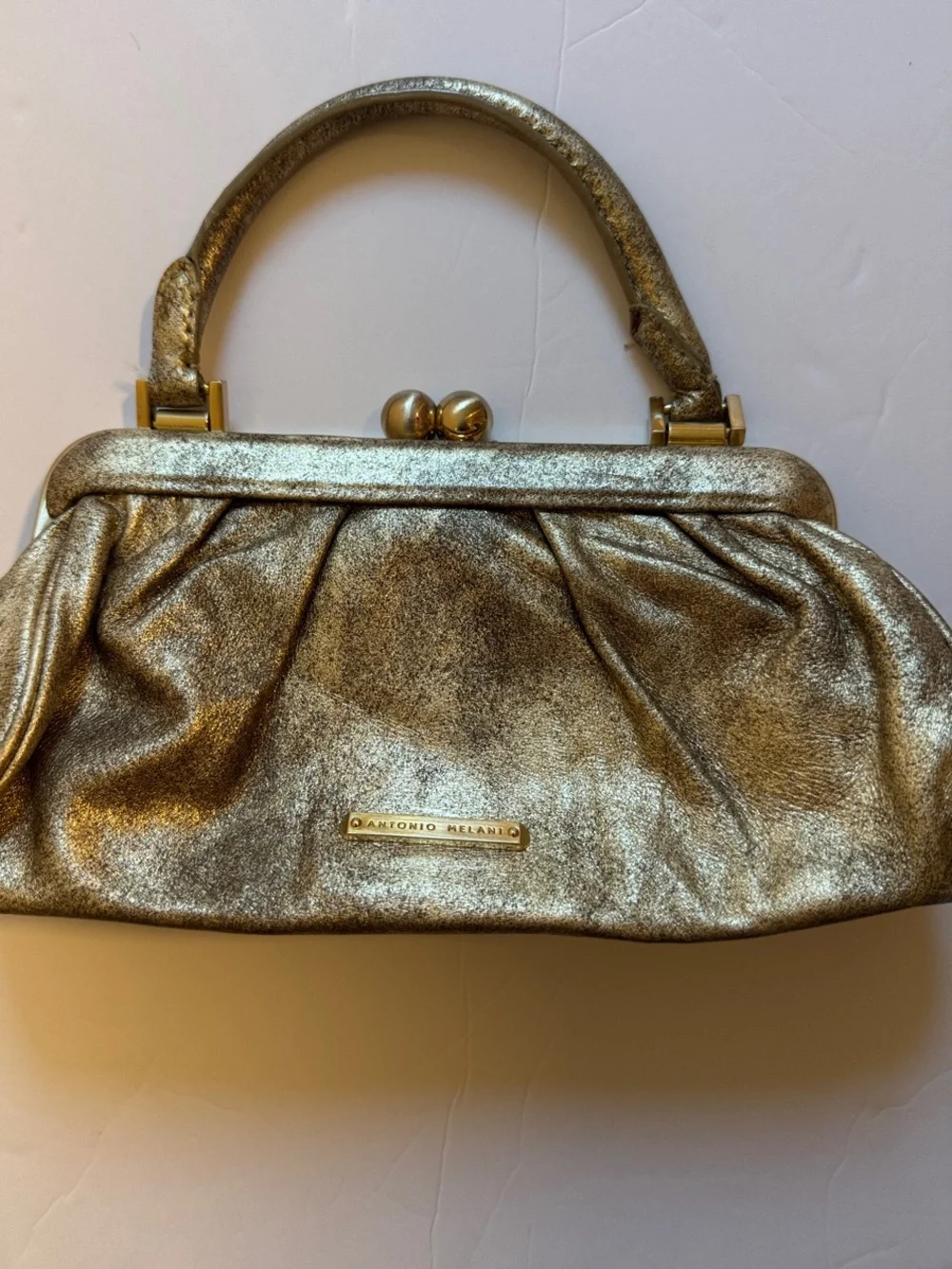 ANTONIO MELANI Metallic Gold Frame-Top Clutch